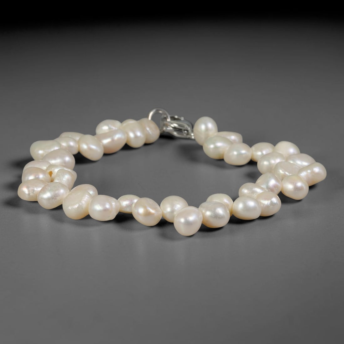 Natural Freshwater Pearl Bracelet - Mini Baroque Cream White Pearl Strand, 96YM: Hand-strung with petite organic baroque natural freshwater pearls featuring soft cream-white pearlescent luster, each bead holding unique tiny asymmetrical freeform shapes formed through natural culti