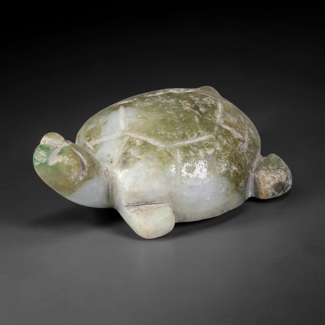 Natural Burmese Type A Mottled Green White Jadeite Jade Turtle Carving, 98TC: Hand-carved from natural Burmese Type A jadeite, this turtle figurine measures 50x35mm. It features mottled pale green and milky white tones with natural surface patina, veining and subtle mineral inc
