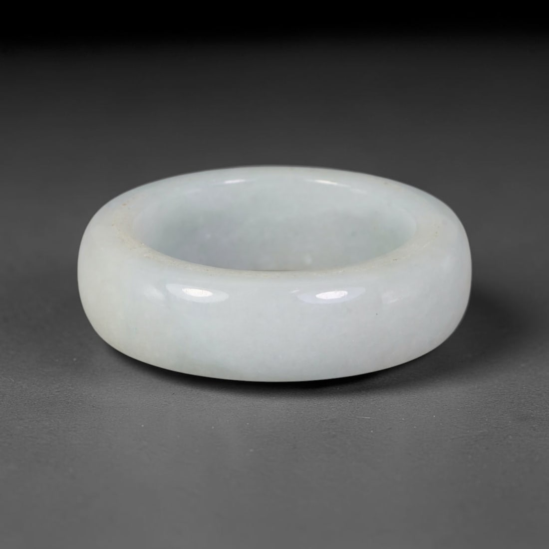 Natural Burmese Type A Jadeite Jade Band Ring Size US 11, 26TB: Crafted from untreated natural Burmese Type A jadeite jade, this solid stone band features a high-gloss polished finish displaying consistent deep green mineral tones interwoven with natural subtle to