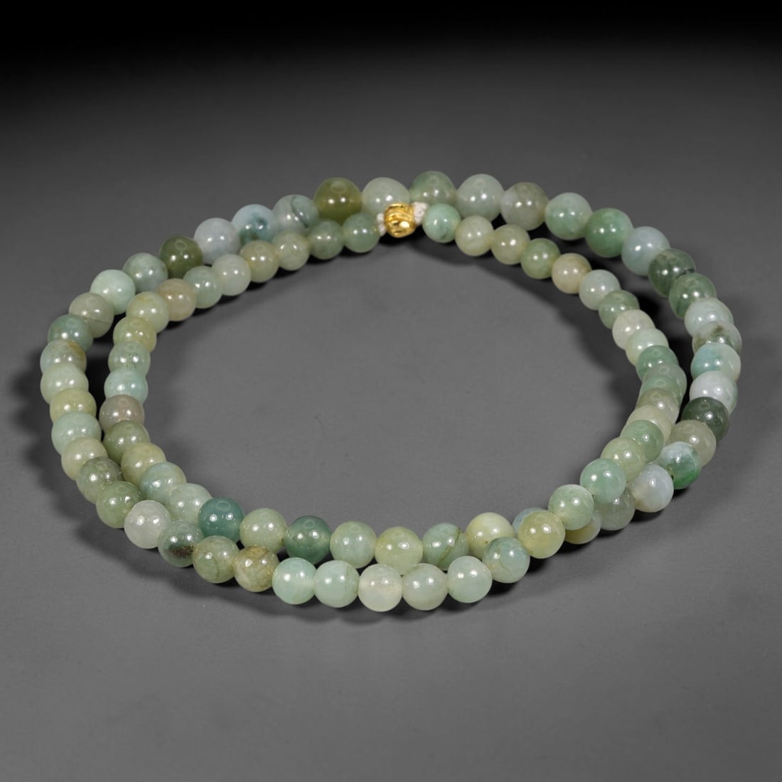 Natural Burmese Type A Multi-Tone Pale Green Jadeite Jade Bead Necklace, 11TF: Smooth round natural Burmese Type A jadeite beads measuring 8.0mm, featuring a blended palette of pale celadon, milky white and soft sage green with natural colour mottling throughout the strand. Fitt