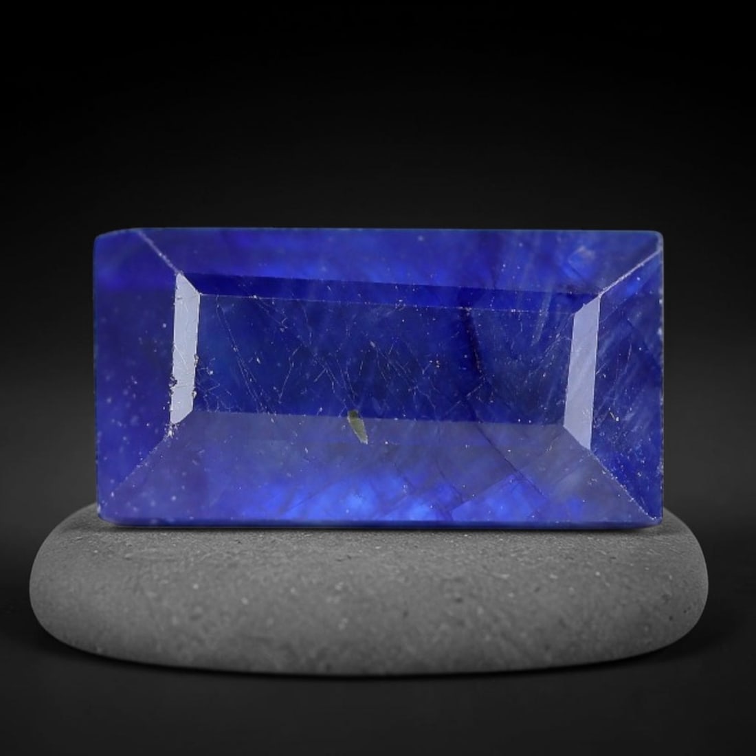 2.91 Carats Royal Blue Sapphire Emerald Cut Loose Gemstone, 6WJ: This sharp emerald rectangular faceted sapphire features an intense deep royal blue hue, brought to vivid life by crisp step-cut facets. Natural fine fissures and scattered tiny mineral micro-inclusio