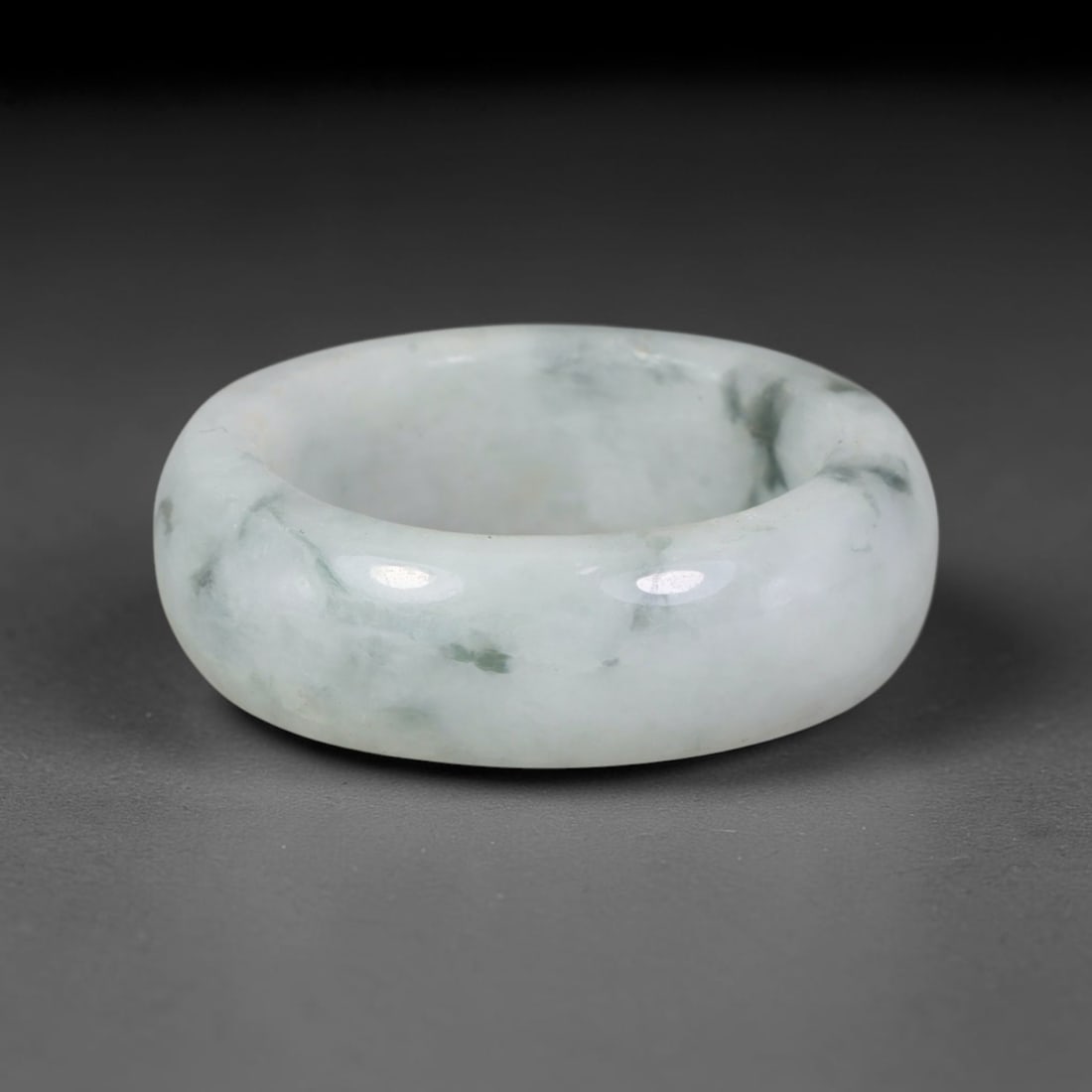 Natural Burmese Type A Jadeite Jade Band Ring Size US 11.5, 50TB: Crafted from untreated natural Burmese Type A jadeite jade, this solid stone band features a high-gloss polished finish displaying consistent deep green mineral tones interwoven with natural subtle to