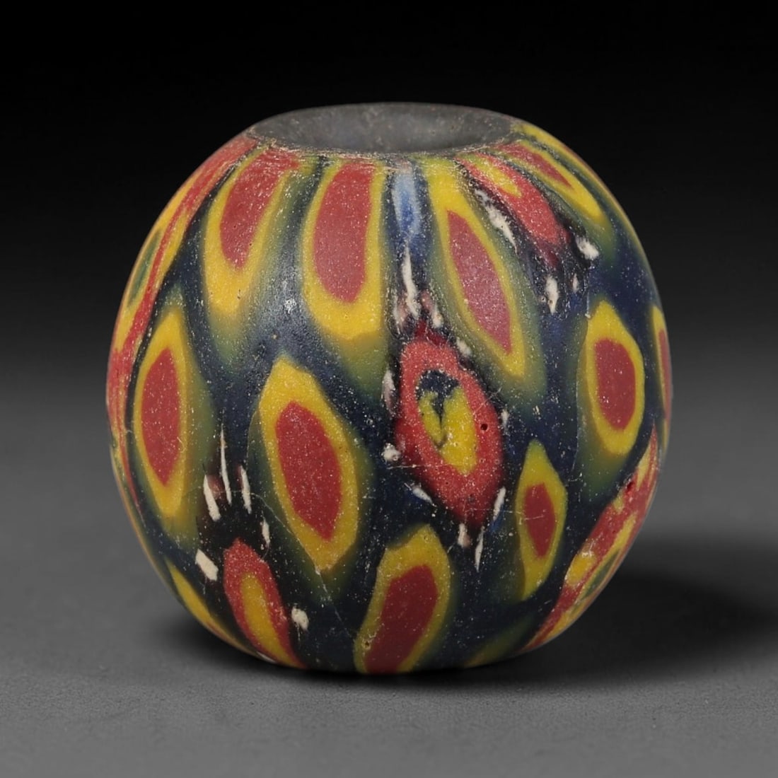 Antique Borneo Glass Trade Bead - 18mm Vintage Handcrafted Bead, 21XD: Antique Borneo glass beads hold deep cultural and historical significance within Southeast Asian maritime trade networks. For centuries, these glass spheres circulated as vital currency, ceremonial ta