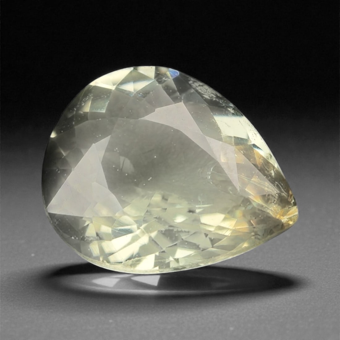 3.05 Carats Tourmaline - Pear Cut Collector Gem , 71WE: This 3.05-carat Tourmaline displays a delicate, pastel hue with a pear cut that highlights its subtle brilliance and exceptional transparency. The gem's soft, almost ethereal glow makes it a unique ca