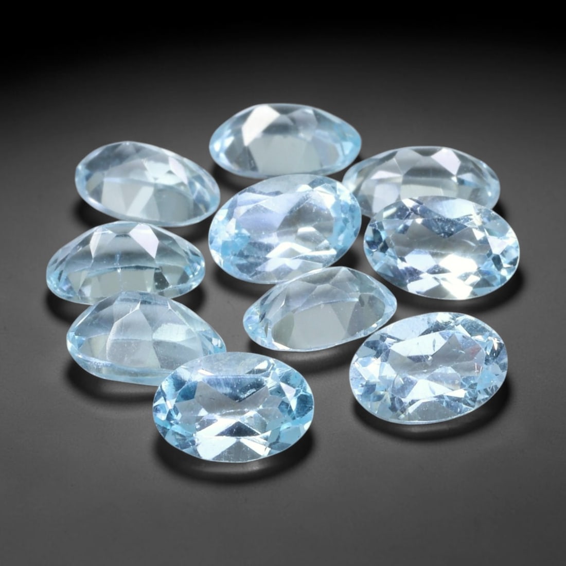 5.48 Carats Natural Brazilian Sky Blue Topaz Oval Faceted Loose Gemstone, 54TS: Constructed from genuine natural topaz sourced from Brazilian mineral deposits, the raw material has been refined through professional faceted lapidary processing with consistent glossy polishing acro