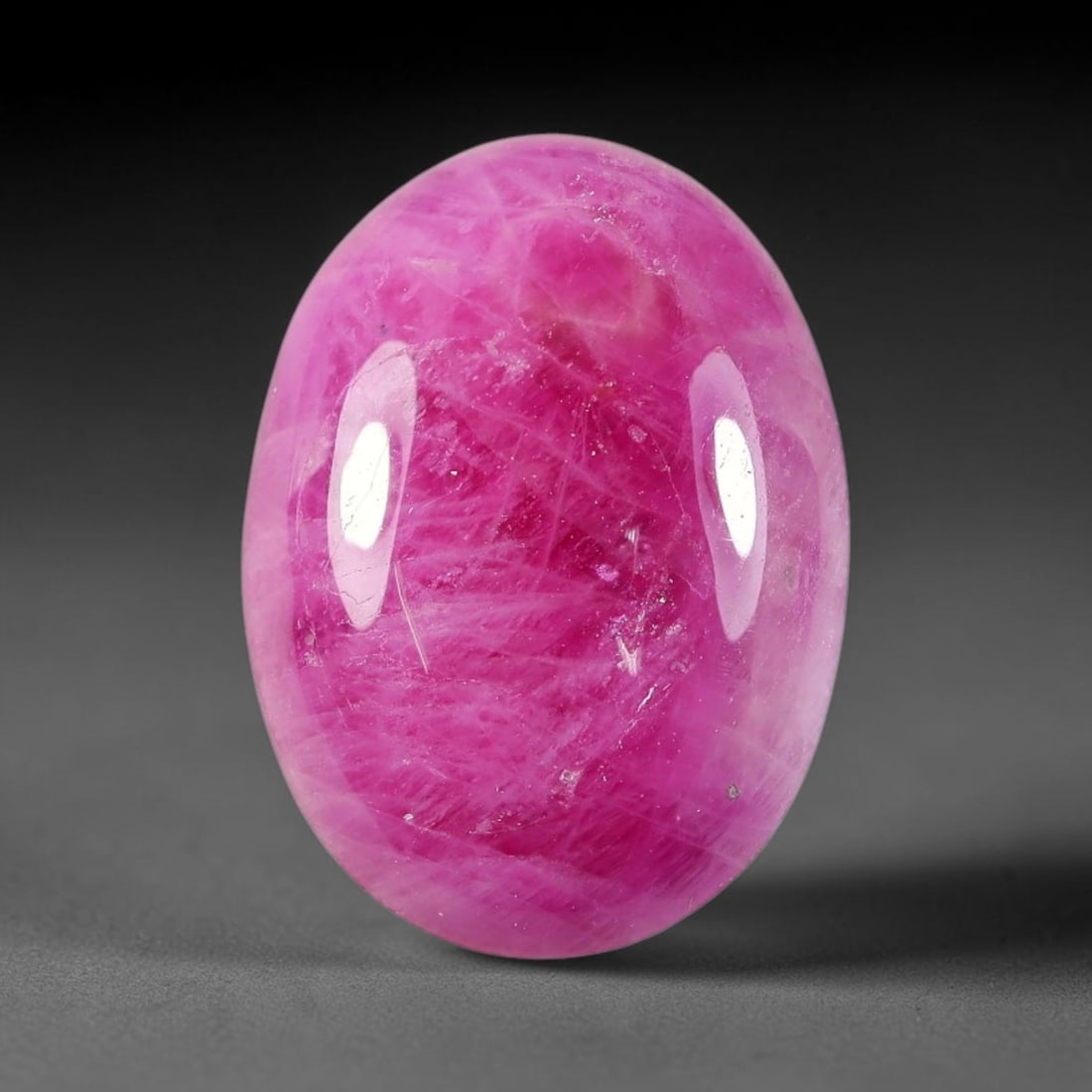 11.21 Carats Natural Mozambique Ruby Cabochon Loose Gemstone, 73TH: This ruby originates from Mozambique natural mineral deposits and receives professional cabochon grinding and polishing treatment to form a smooth glossy exterior surface. Tiny mineral particles and n