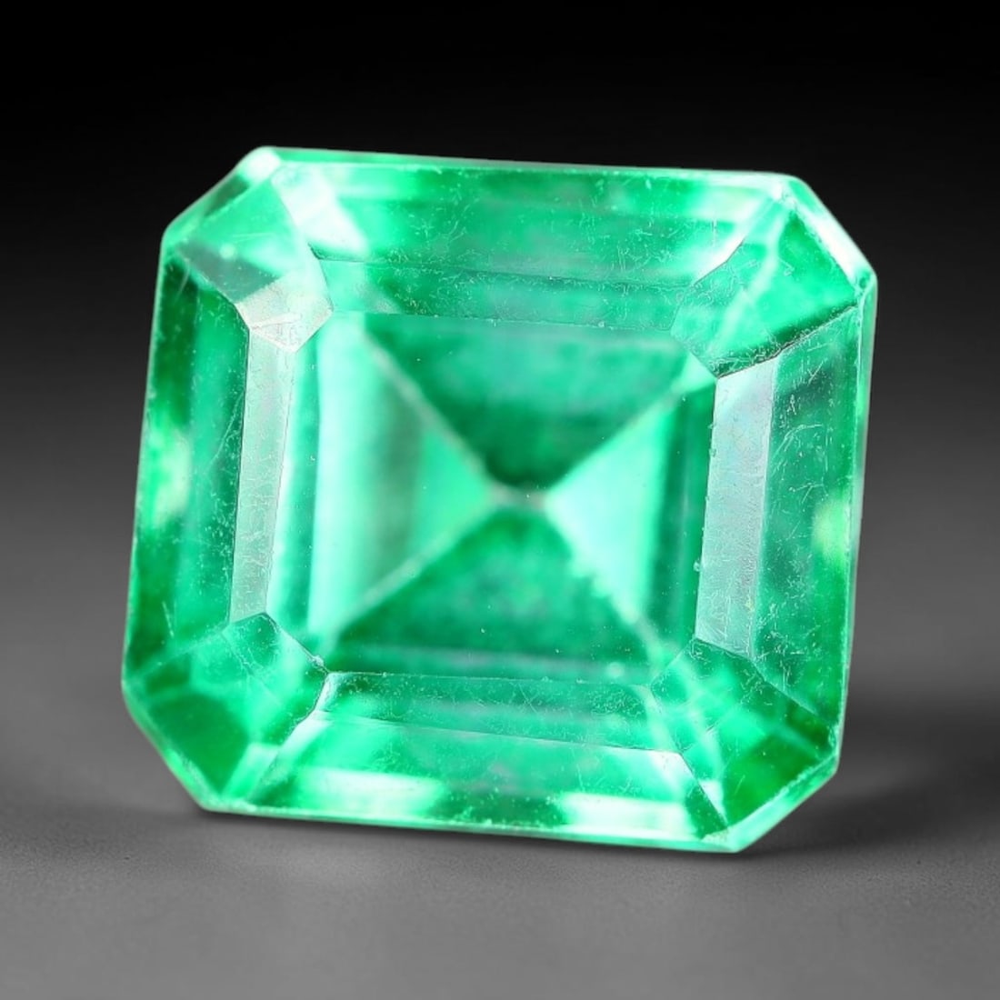 6.04 Carats Natural Brazilian Green Topaz Faceted Loose Gemstone, 1TM: This natural topaz originates from Brazilian mineral formations and undergoes professional faceted lapidary finishing with uniform high-gloss polishing across all outer crystal facets. Natural fine in