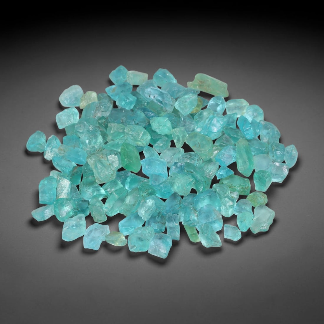 115.78ct Natural Blue Apatite Rough Parcel Loose Gemstone, 57YS: Natural apatite rough parcel featuring fresh bright blue colouration with subtle tonal variations across each crystal piece. Raw crystalline surfaces display authentic natural mineral textures and inh