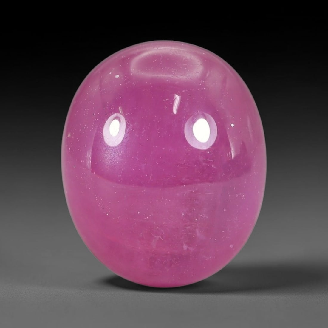 12.36 Carats Natural Mozambique Ruby Cabochon Loose Gemstone, 51TM: This ruby originates from Mozambique natural mineral deposits and receives professional cabochon grinding and polishing treatment to form a smooth glossy exterior surface. Tiny mineral particles and n