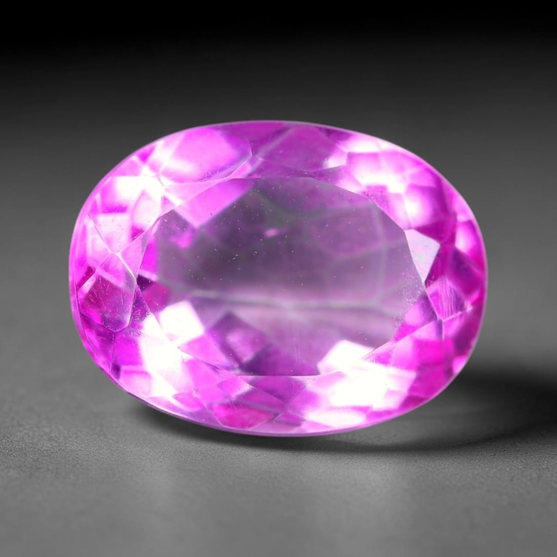 3.95 Carats Natural Brazilian Pink Topaz Oval Faceted Loose Gemstone, 86TH: This specimen is composed of natural topaz sourced from Brazilian mineral deposits, processed via professional faceted lapidary techniques with consistent glossy polishing applied to the entire crysta