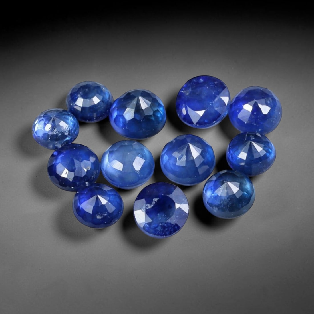 3.21ct Natural Royal Blue Sapphire Round Rose Cut Loose Gemstone, 97YW: This parcel consists of multiple natural sapphire gemstones, each fashioned with a round rose cut displaying a rich royal blue hue. Natural internal inclusions are visible within the corundum crystals