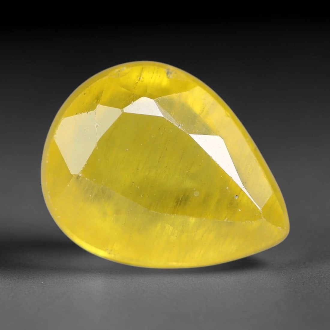 2.76 Carats Natural Yellow Sapphire Pear Faceted Loose Gemstone, 53YW: This natural yellow sapphire features a classic pear brilliant faceted cut, holding consistent warm golden-yellow color throughout the corundum crystal. Fine microscopic mineral specks and faint natur