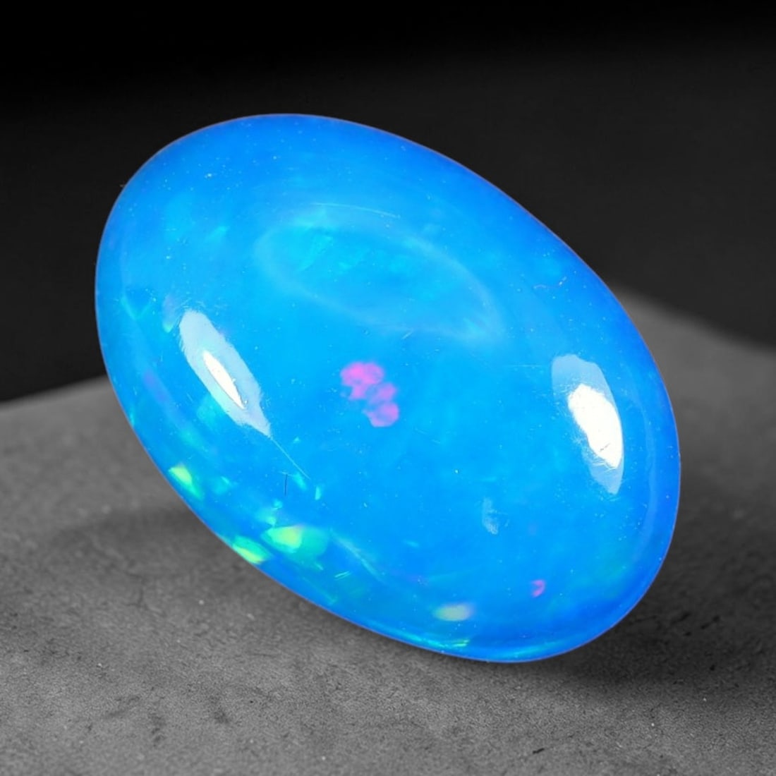 3.33ct Natural Ethiopian Welo Blue Fire Opal Cabochon Loose Gemstone, 87TS: This opal is sourced from Ethiopian Welo natural opal deposits and shaped into a smooth polished cabochon form with refined lapidary finishing work. Bright warm blue base accompanied by vivid internal