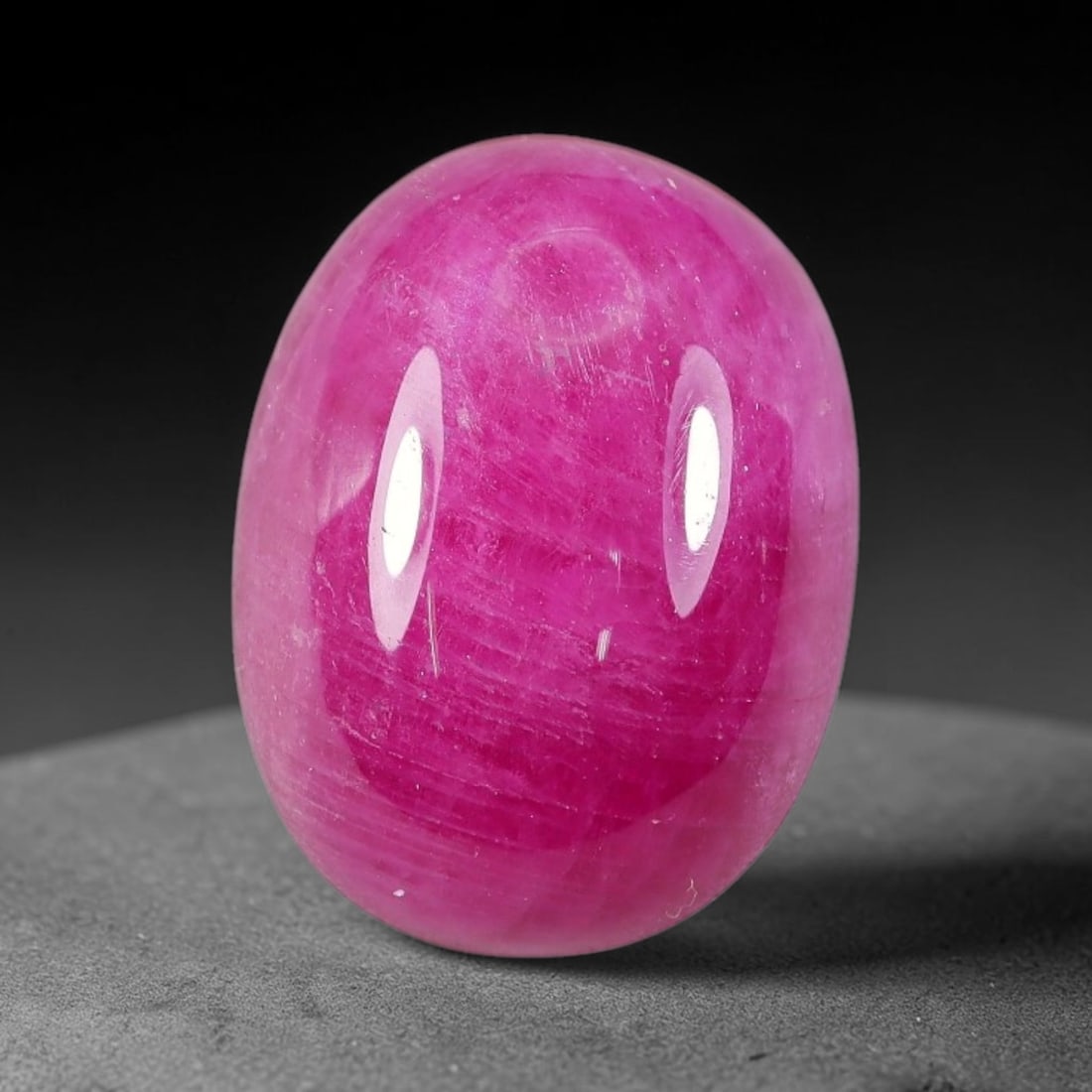 12.92 Carats Natural Mozambique Ruby Cabochon Loose Gemstone, 77TH: This ruby originates from Mozambique natural mineral deposits and receives professional cabochon grinding and polishing treatment to form a smooth glossy exterior surface. Tiny mineral particles and n