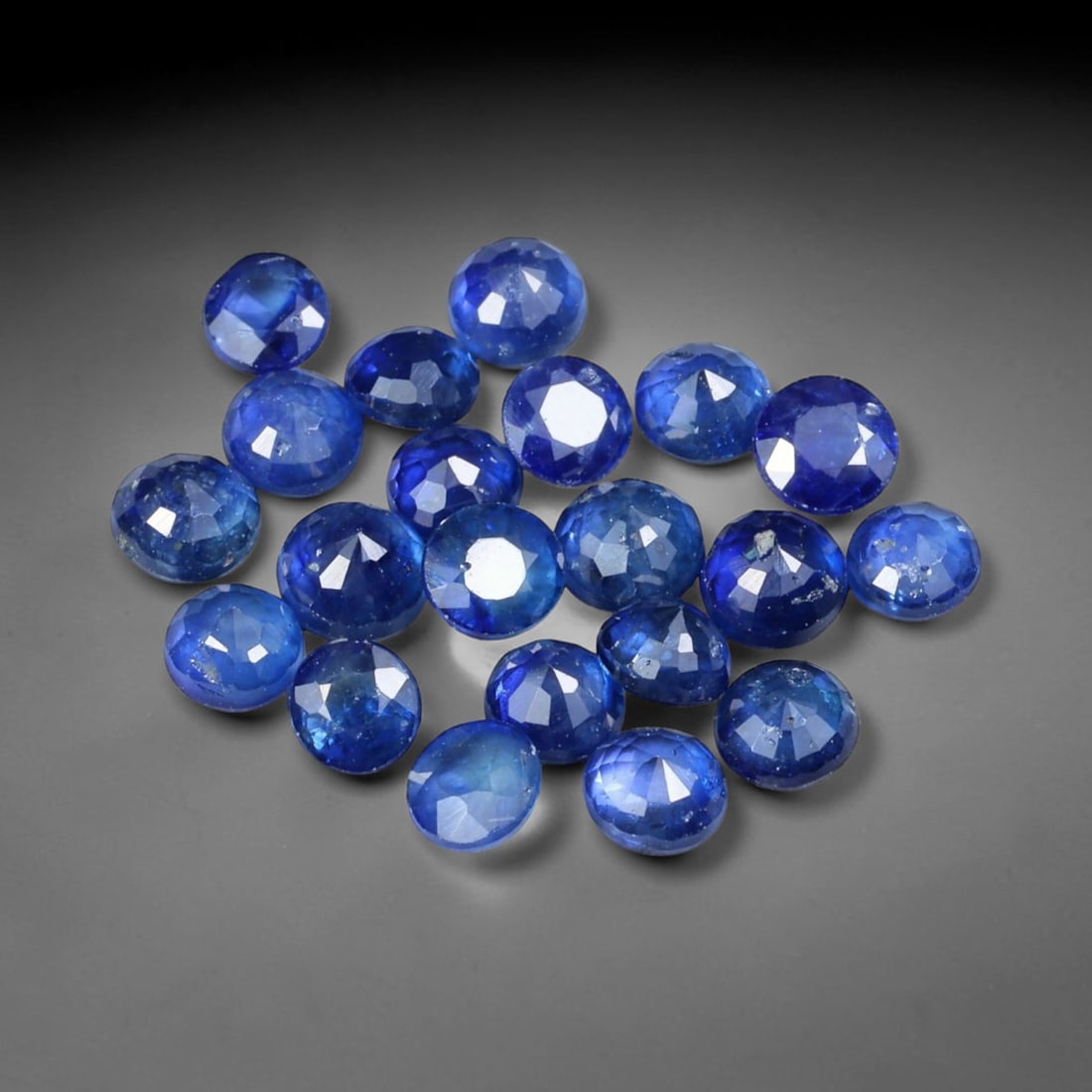 4.87ct Natural Royal Blue Sapphire Round Rose Cut Loose Gemstone, 89YW: This parcel consists of multiple natural sapphire gemstones, each fashioned with a round rose cut displaying a rich royal blue hue. Natural internal inclusions are visible within the corundum crystals