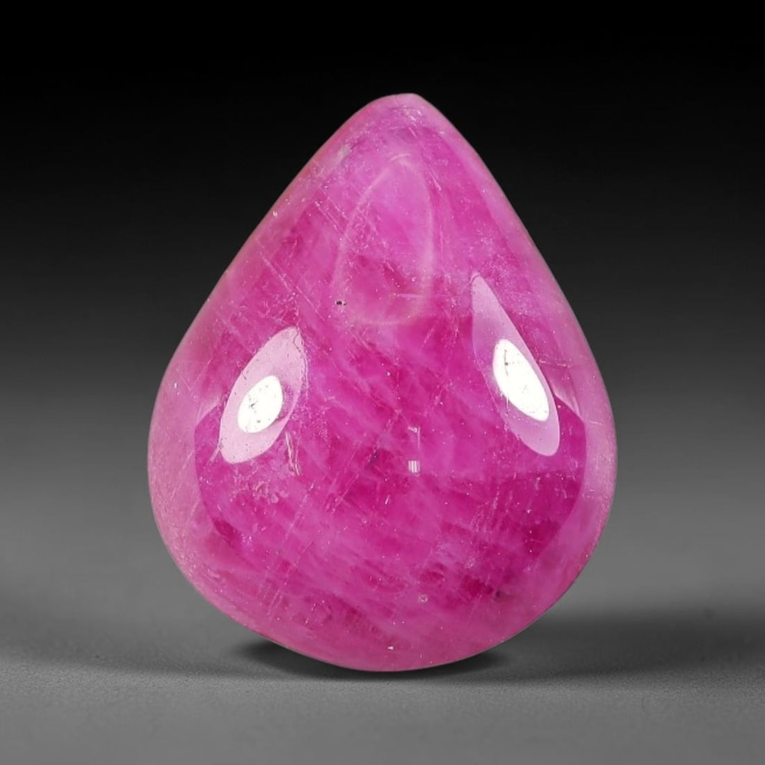 7.06 Carats Natural Mozambique Ruby Cabochon Loose Gemstone, 78TH: This ruby originates from Mozambique natural mineral deposits and receives professional cabochon grinding and polishing treatment to form a smooth glossy exterior surface. Tiny mineral particles and n