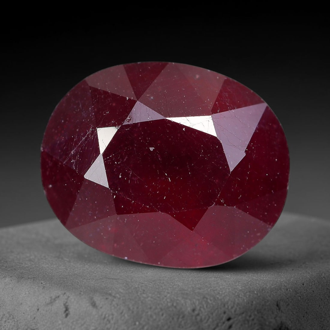 5.48 Carats Natural Madagascar Ruby Oval Faceted Loose Gemstone, 25TM: This sizable natural Madagascar ruby is cut into an oval brilliant faceted form, showcasing rich saturated crimson red hue characteristic of Malagasy corundum. Extensive natural internal silk veining,