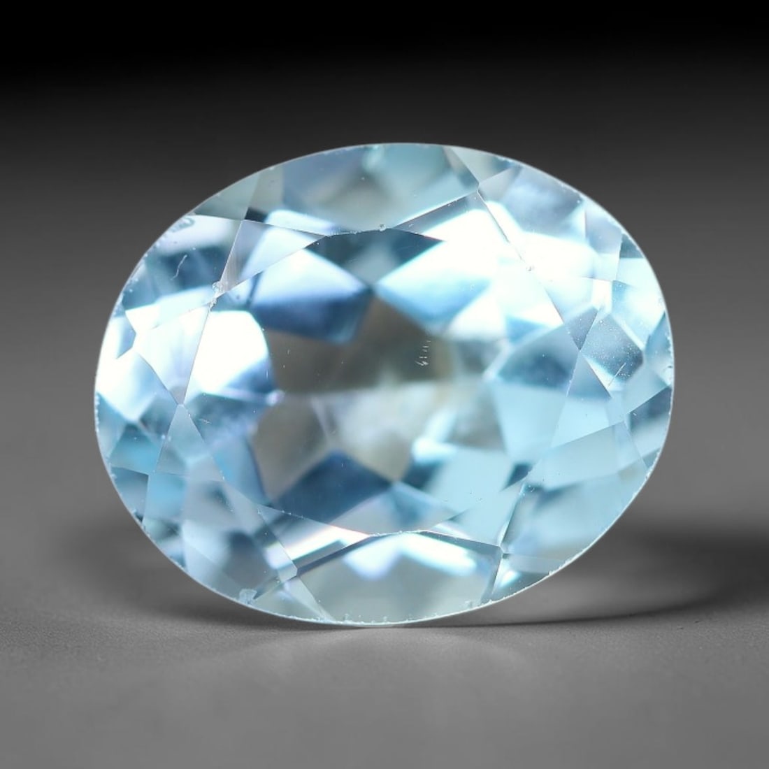 4.37 Carats Natural Brazilian Sky Blue Topaz Oval Faceted Loose Gemstone, 60TS: Constructed from genuine natural topaz sourced from Brazilian mineral deposits, the raw material has been refined through professional faceted lapidary processing with consistent glossy polishing acro