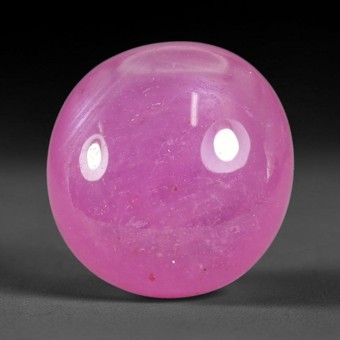 14.91 Carats Natural Mozambique Ruby Cabochon Loose Gemstone, 52TM: This ruby originates from Mozambique natural mineral deposits and receives professional cabochon grinding and polishing treatment to form a smooth glossy exterior surface. Tiny mineral particles and n