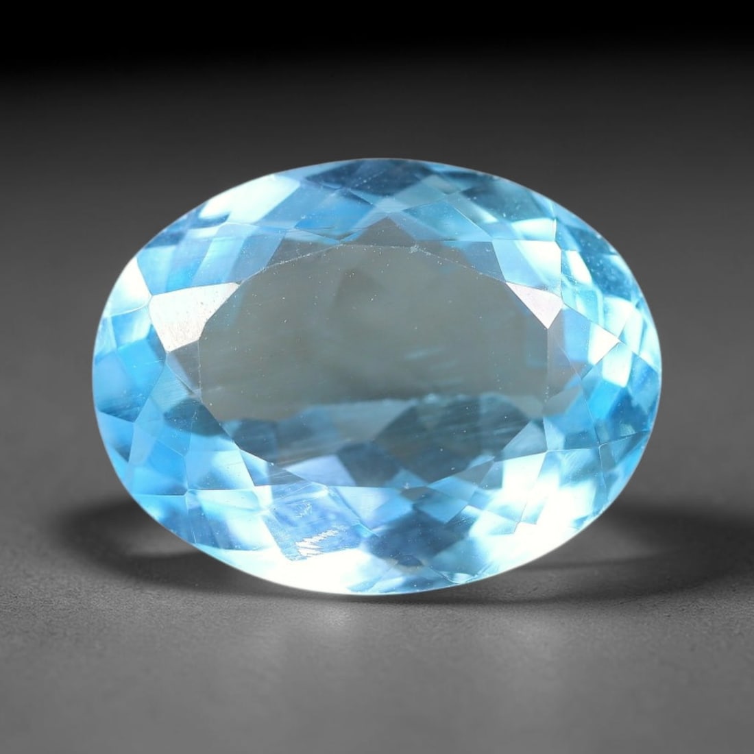 13.35 Carats Natural Brazilian Sky Blue Topaz Oval Faceted Loose Gemstone, 28YW: Constructed from genuine natural topaz sourced from Brazilian mineral deposits, the raw material has been refined through professional faceted lapidary processing with consistent glossy polishing acro