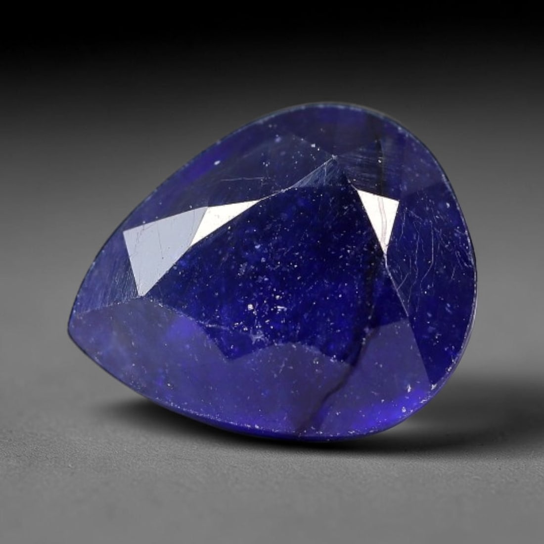 3.80 Carats Royal Blue Sapphire Pear Faceted Loose Gemstone, 3YW: This classic pear faceted sapphire displays rich saturated royal blue color glowing through crisp polished multi-facet cuts, featuring natural fine internal fissures and tiny scattered mineral micro s