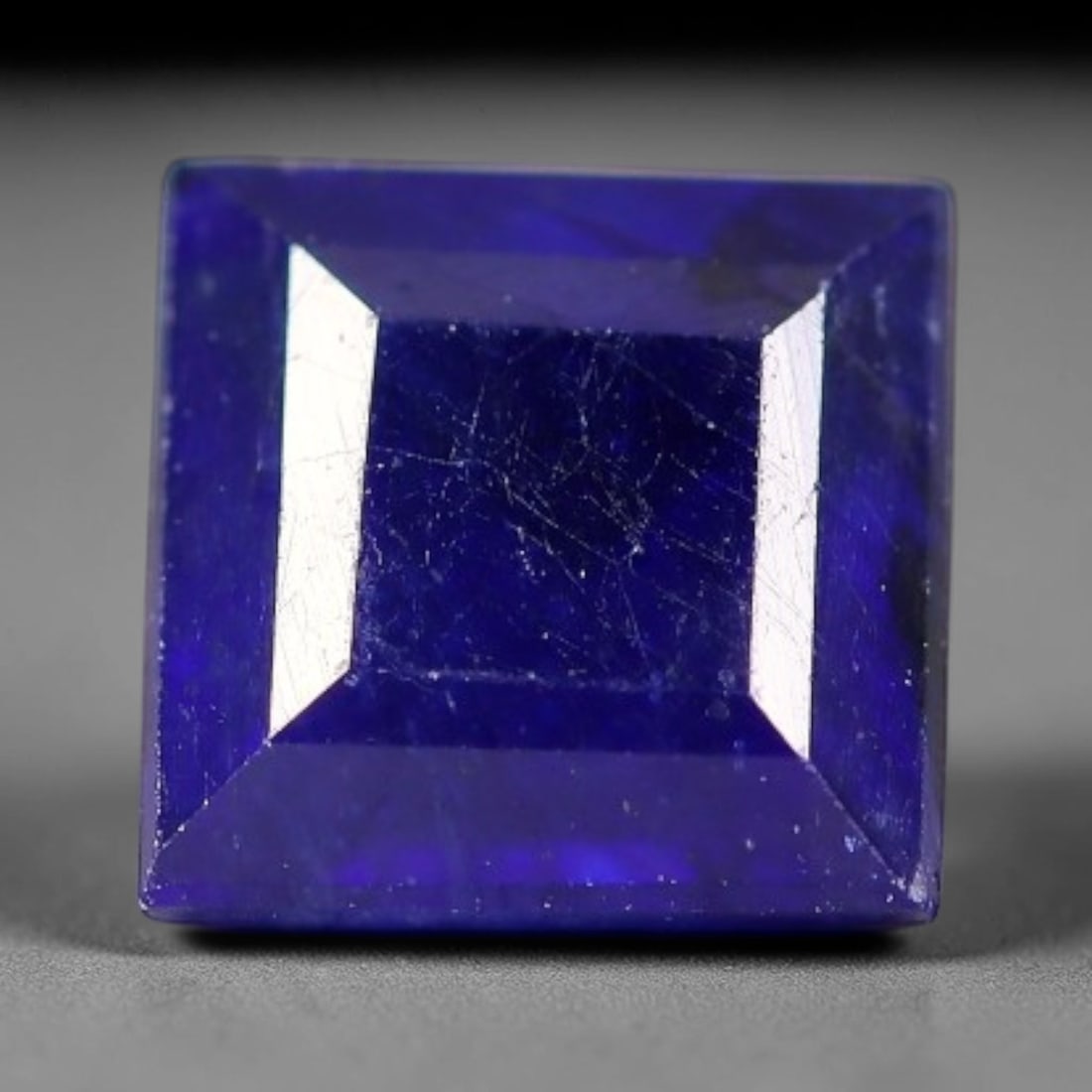 2.11 Carats Royal Blue Sapphire Square Cushion Faceted Loose Gemstone, 1YW: This classic square cushion modified step cut faceted sapphire displays rich saturated royal blue color glowing through crisp polished multi-facet cuts, featuring natural fine internal fissures and ti