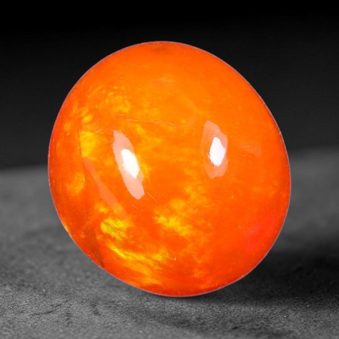 3.30ct Natural Ethiopian Welo Orange Fire Opal Cabochon Loose Gemstone, 98TH: This opal is sourced from Ethiopian Welo natural opal deposits and shaped into a smooth polished cabochon form with refined lapidary finishing work. Bright warm orange base accompanied by vivid intern
