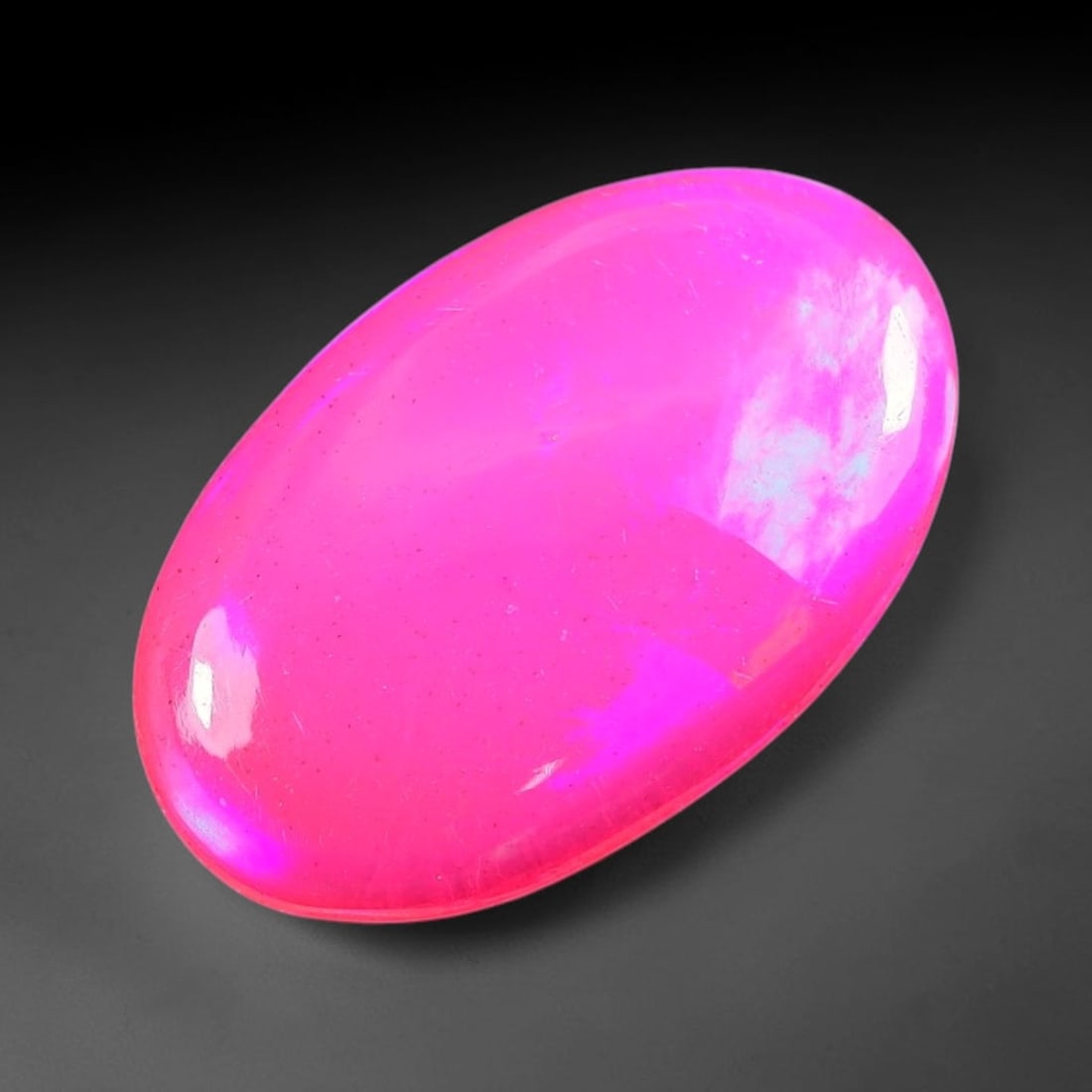 2.70ct Natural Ethiopian Welo Pink Fire Opal Cabochon Loose Gemstone, 94TS: This opal is sourced from Ethiopian Welo natural opal deposits and shaped into a smooth polished cabochon form with refined lapidary finishing work. Bright warm pink base accompanied by vivid internal