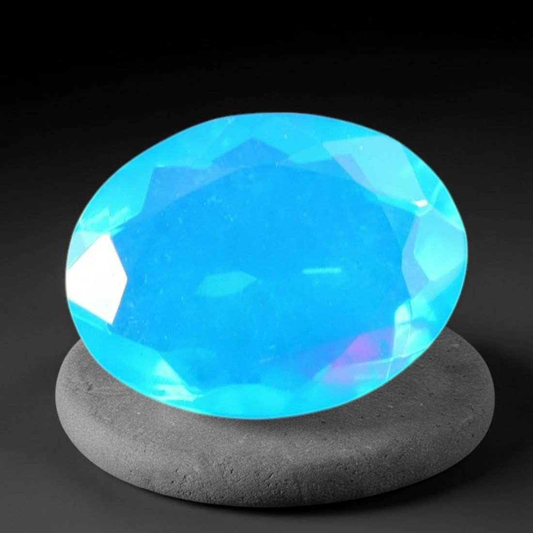 1.75 Carats Natural Ethiopian Welo Blue Fire Opal Oval Faceted Loose Gemstone, 92TS: This opal material is mined from the Welo deposits of Ethiopia and processed with professional faceted lapidary work with uniform polished facets across the gem surface. Natural subtle internal textur