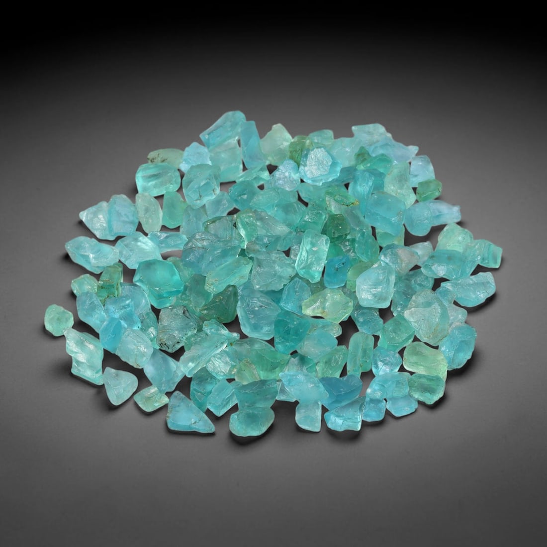 110.39ct Natural Blue Apatite Rough Parcel Loose Gemstone, 49YS: Natural apatite rough parcel featuring fresh bright blue colouration with subtle tonal variations across each crystal piece. Raw crystalline surfaces display authentic natural mineral textures and inh