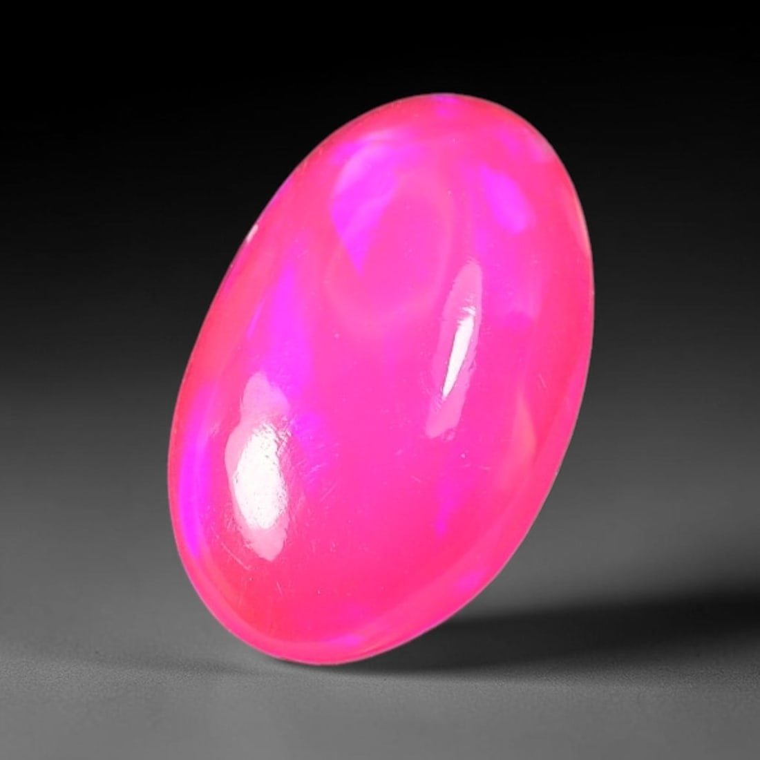 2.49ct Natural Ethiopian Welo Pink Fire Opal Cabochon Loose Gemstone, 88TH: This opal is sourced from Ethiopian Welo natural opal deposits and shaped into a smooth polished cabochon form with refined lapidary finishing work. Bright warm pink base accompanied by vivid internal