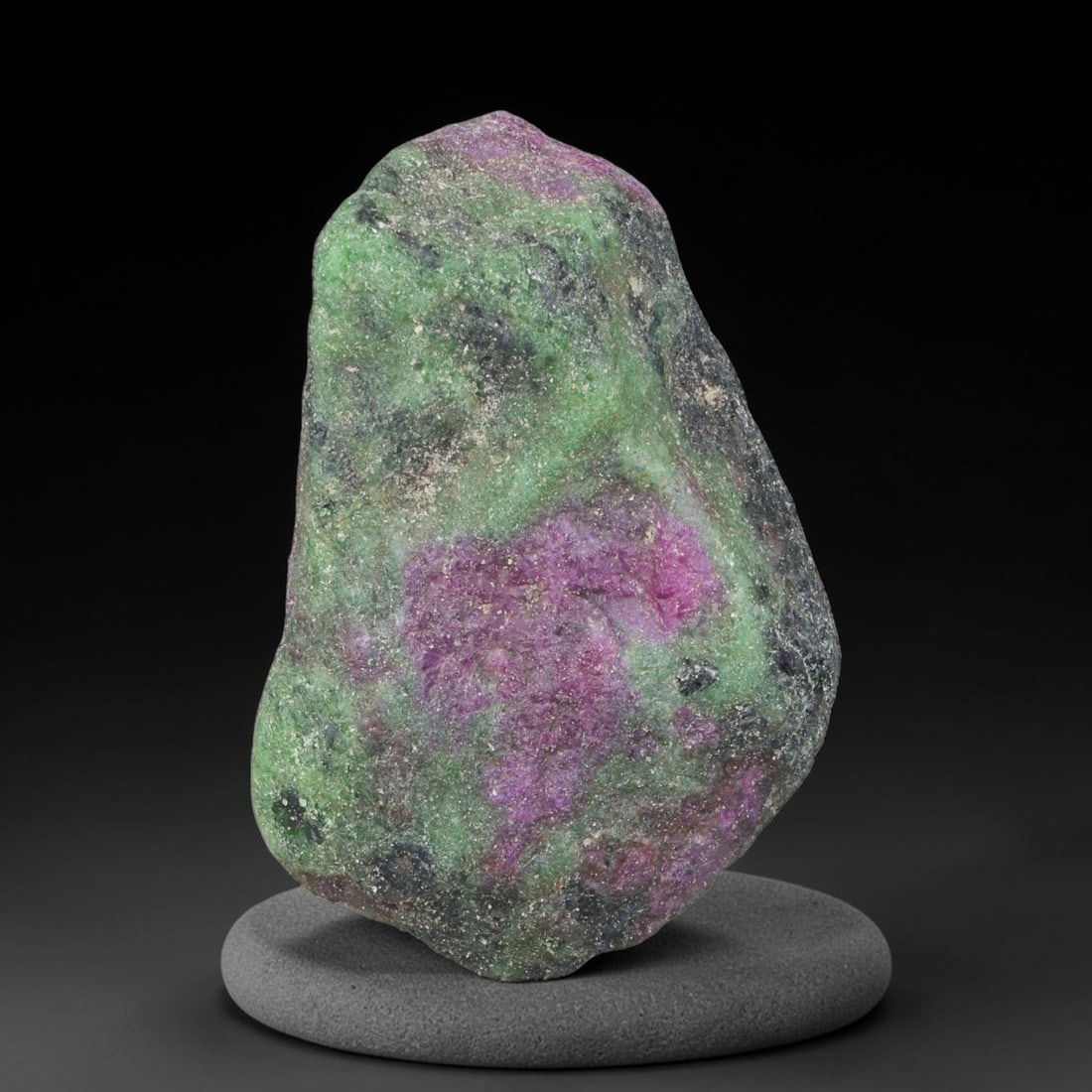 164.28ct Natural Tanzanian Ruby Zoisite Raw Rough Specimen Mineral Stone, 62YT: This unpolished mineral rough is natural ruby zoisite sourced from Tanzania, exhibiting distinct banded mineral segregation of vibrant green zoisite, magenta ruby crystals, and dark hornblende inclusi