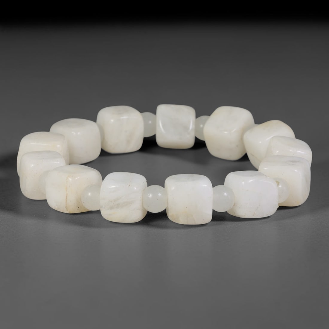 Natural Burmese Type A Milky White Cube Jadeite Jade Beaded Bracelet, 25TA: Crafted from untreated natural Burmese Type A jadeite with 10.1mm matte polished square cube beads, spaced with tiny round jadeite spacer beads. The stones feature soft milky white base with subtle na