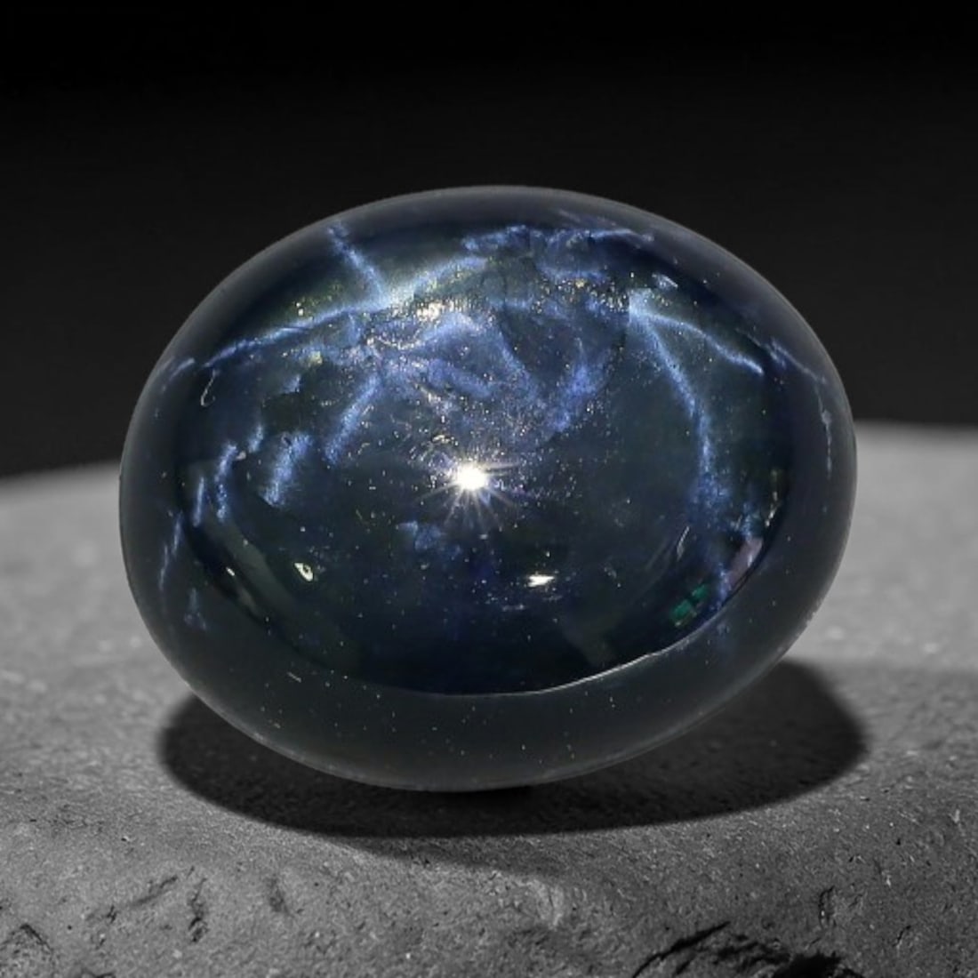 5.98 Carats Natural 6 Ray Blue Star Sapphire Loose Gemstone, 51XX: This star sapphire is crafted from natural corundum deposits and refined into a sleek polished cabochon form through professional lapidary finishing procedures. The distinct six-ray star asterism disp