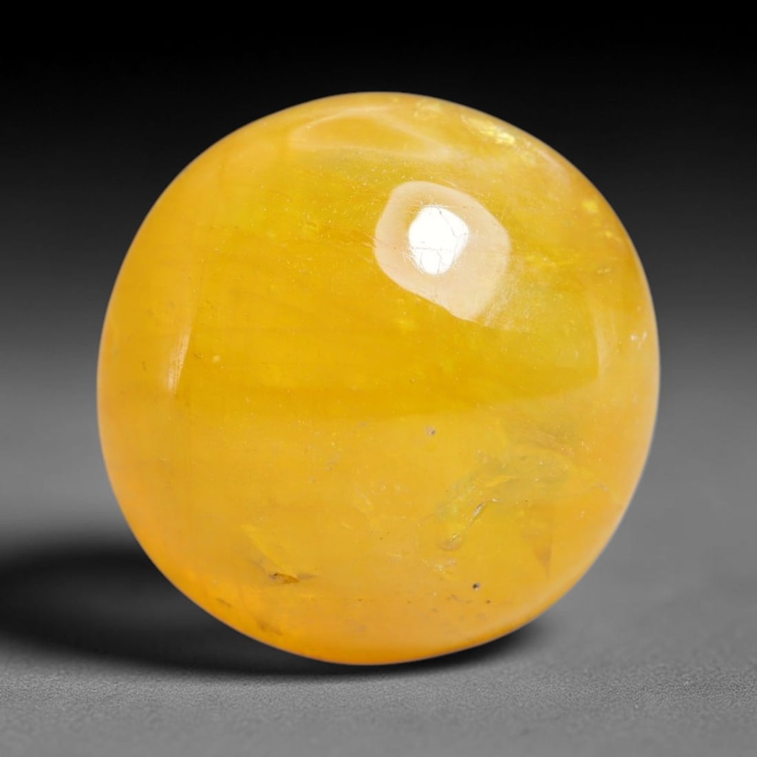 9.28 Carats Natural Madagascar Yellow Sapphire Cabochon Loose Gemstone, 93XY: Formed of natural corundum sourced from Madagascar geological formations, this raw mineral material is shaped and polished into a smooth cabochon form via professional stone processing techniques. Nat