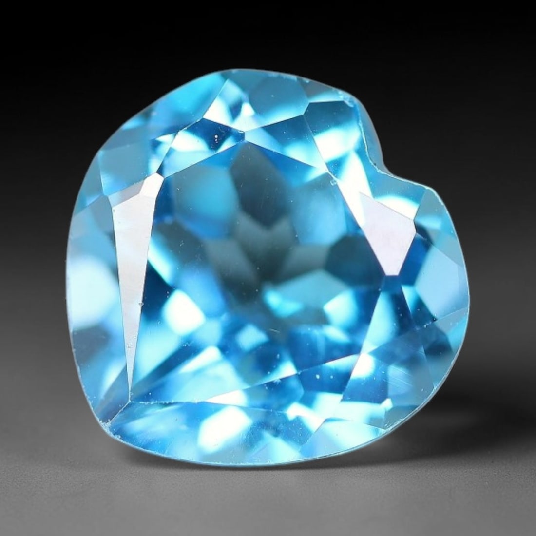3.81 Carats Natural Swiss Blue Topaz Loose Gemstone, 5WP: This genuine natural swiss blue topaz displays consistent saturated blue coloration inherent to unprocessed natural mineral specimens. Formed through natural geological formation, the stone carries su