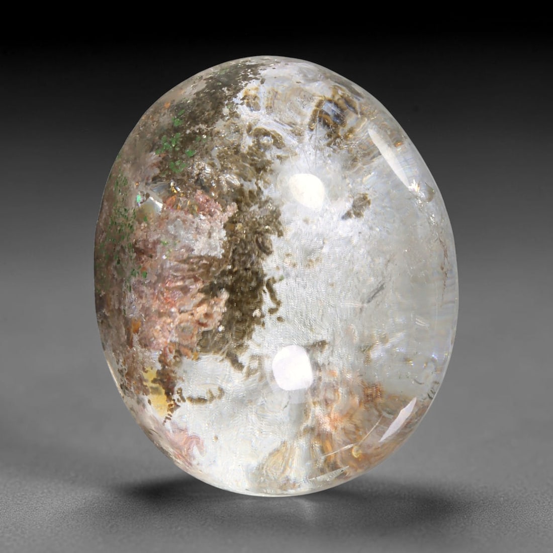 23ct Natural Brazilian Phantom Quartz Oval Cabochon Loose Gemstone, 65YX: This smoothly polished cabochon of natural phantom quartz preserves delicate layered phantom crystal formations enclosed inside transparent quartz host. The domed polished surface offers unobstructed 