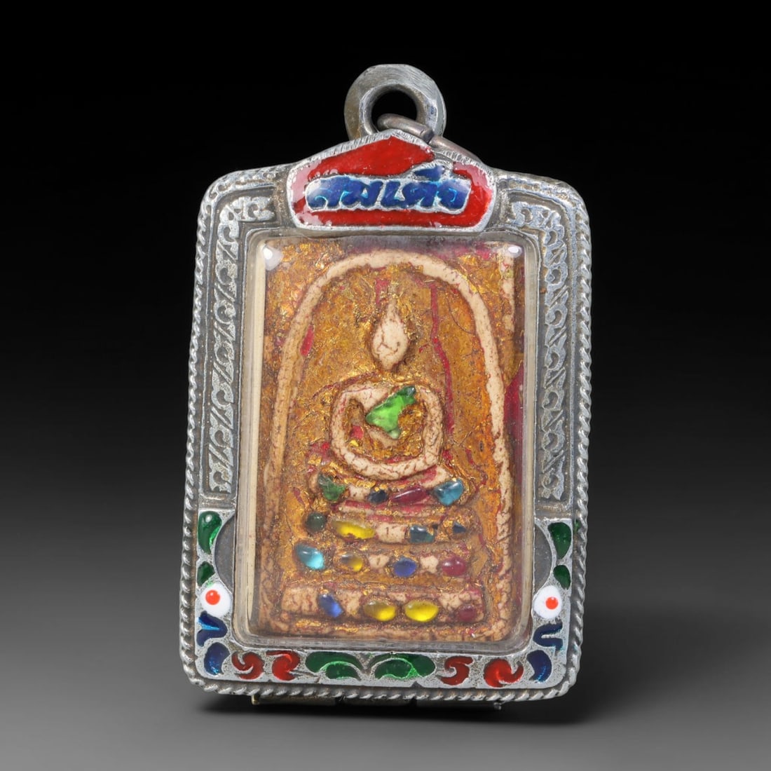 Thai Gilded Clay Metal Amulet Buddhist Votive Pendant, 30ZB: Formed from fired clay with applied gilded surface layers, the piece uses traditional molding techniques characteristic of Southeast Asian devotional craft. The construction adheres to standard region