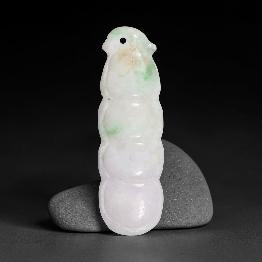 Natural Burmese Type A Jadeite Jade Hand Carved Pendant, 30TC: Artisan hand-carved untreated Burmese Type A jadeite jade pendant measuring 49.6x15.6 mm. Carefully sculpted with detailed relief craftsmanship and finished with a smooth glossy polish. Authentic Type