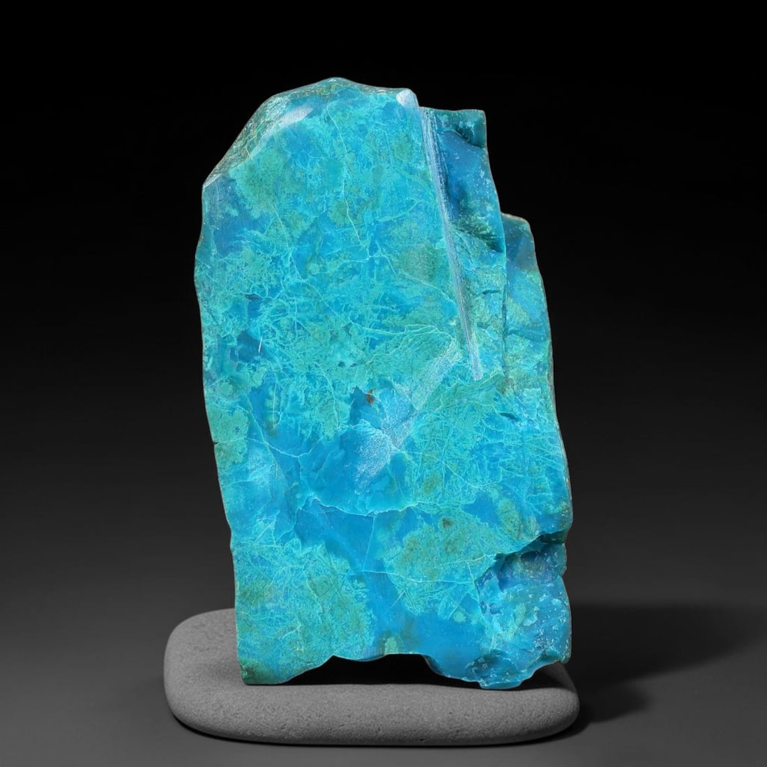 90.68ct Natural Peruvian Chrysocolla Polished Slab Rough, 85YS: This partial-polished chrysocolla slab features blended mineral matrix with smooth refined face and unaltered natural rugged edge across its 42x22x12mm elongated form, translucent mineral layers hold 