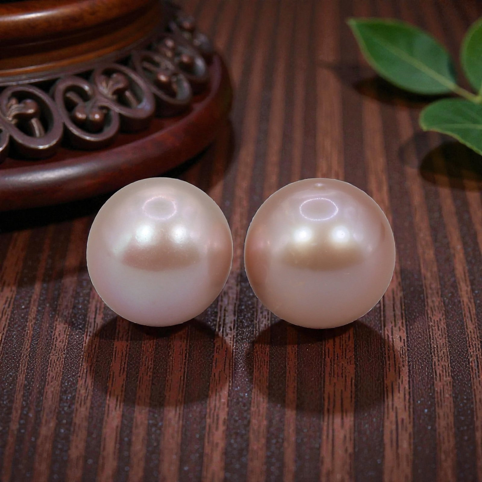 Freshwater Pearl Pair - Natural Pearl Pink Round Gemstones 10.7mm, 35XA: A matched pair of natural freshwater pearls, exhibiting soft pinkish-peach body tones with fine, even luster and subtle orient. The pearls are near-spherical, with smooth nacre and minimal natural sur
