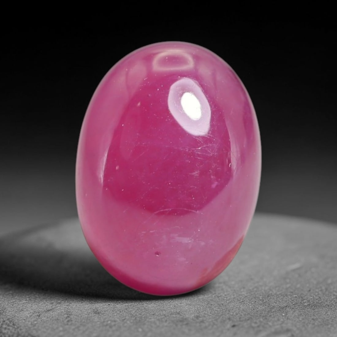 7.80 Carats Natural Mozambique Ruby Cabochon Loose Gemstone, 14XX: This ruby originates from Mozambique natural mineral deposits and receives professional cabochon grinding and polishing treatment to form a smooth glossy exterior surface. Tiny mineral particles and n