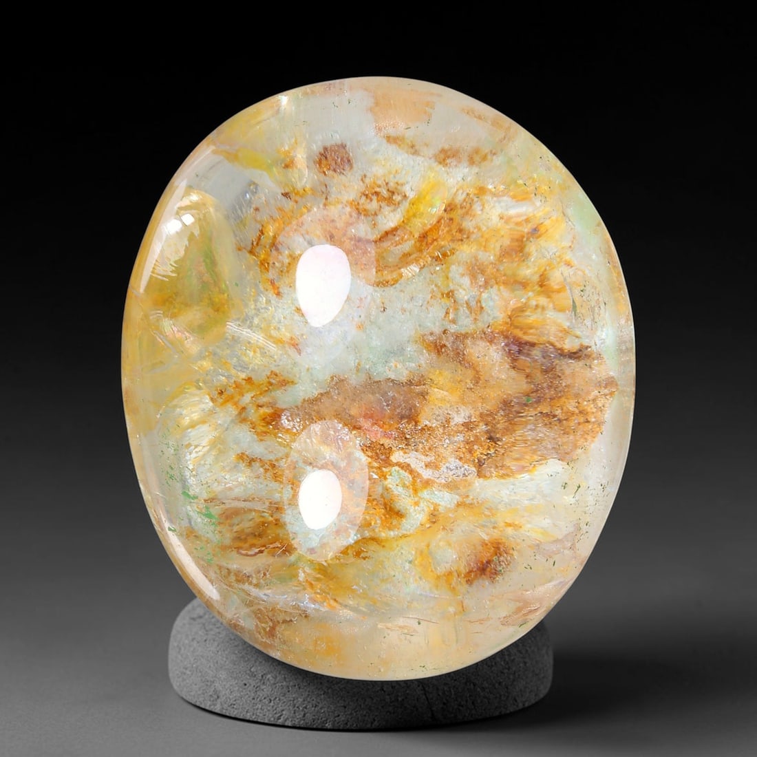 33.60ct Natural Brazilian Phantom Quartz Oval Cabochon Loose Gemstone, 65YV: This smoothly polished cabochon of natural phantom quartz preserves delicate layered phantom crystal formations enclosed inside transparent quartz host. The domed polished surface offers unobstructed 