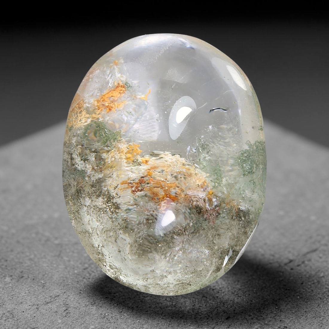 17.17ct Natural Brazilian Phantom Quartz Oval Cabochon Loose Gemstone, 21YX: This smoothly polished cabochon of natural phantom quartz preserves delicate layered phantom crystal formations enclosed inside transparent quartz host. The domed polished surface offers unobstructed 