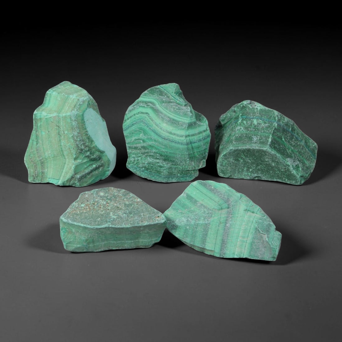 315ct Natural Malachite Rough Raw Mineral Specimen, 46YT: Formed through natural geological mineralization processes, this unpolished malachite rough displays inherent textural layering developed over prolonged underground formation cycles. The material reta