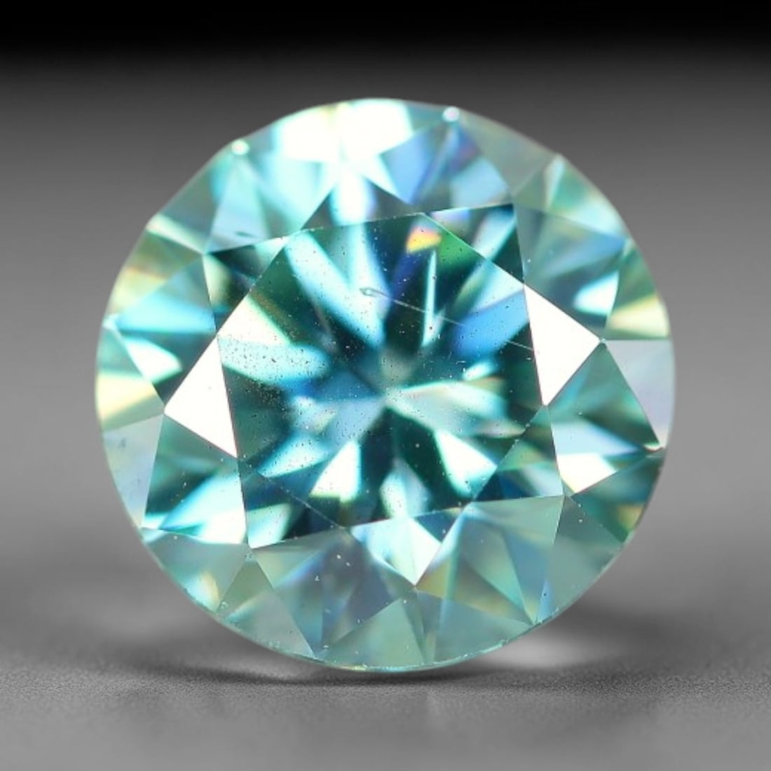 0.77 Carats Aqua Toned Moissanite Loose Gemstone, 54WP: This moissanite features dimensional measurements of 6x3.7mm, lab-grown silicon carbide material valued for superior light refraction that delivers vivid multi-hued sparkle across all lighting conditi