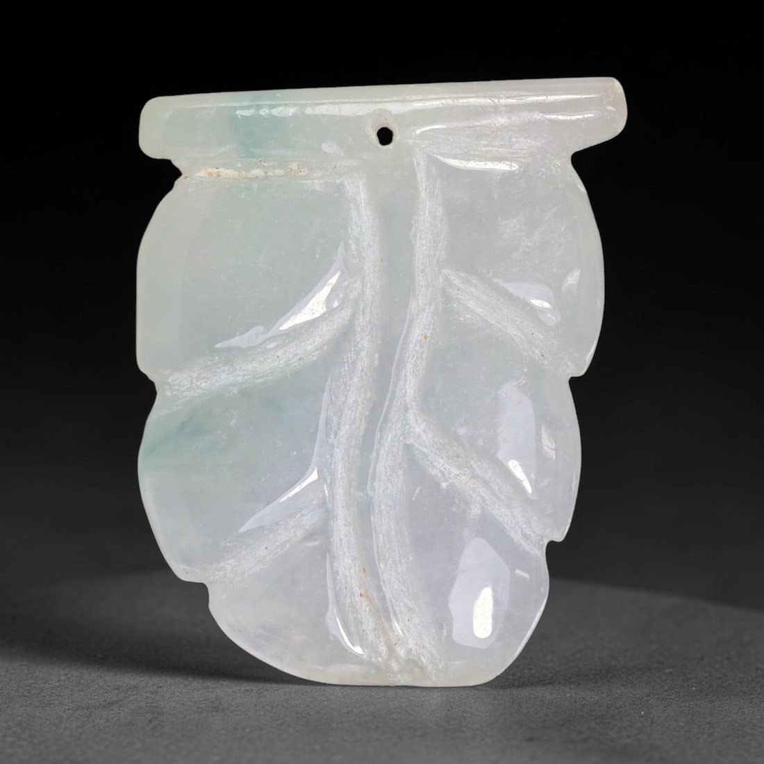 Natural Burmese Type A Jadeite Jade Hand Carved Pendant, 5TC: Artisan hand-carved untreated Burmese Type A jadeite jade pendant measuring 32x26 mm. Carefully sculpted with detailed relief craftsmanship and finished with a smooth glossy polish. Authentic Type A j