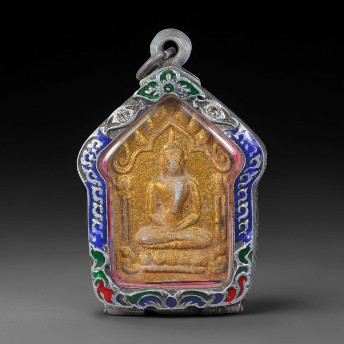 Thai Gilded Metal Amulet Buddhist Votive Pendant, 81ZB: Crafted from base metal finished with gilded surface treatment, the piece bears traditional pressed casting techniques typical of Southeast Asian devotional artifacts. The form follows regional devoti