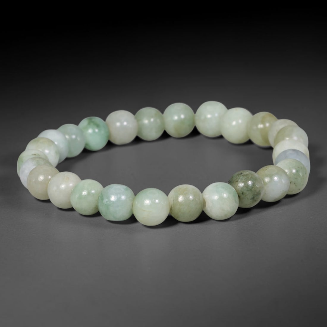 Natural Burmese Type A Pale Green Floating Jadeite Jade Beaded Bracelet, 80TA: This bracelet is made of fully untreated authentic Burmese Type A jadeite, featuring evenly polished smooth round beads with milky white base naturally adorned with scattered soft floating green mottl