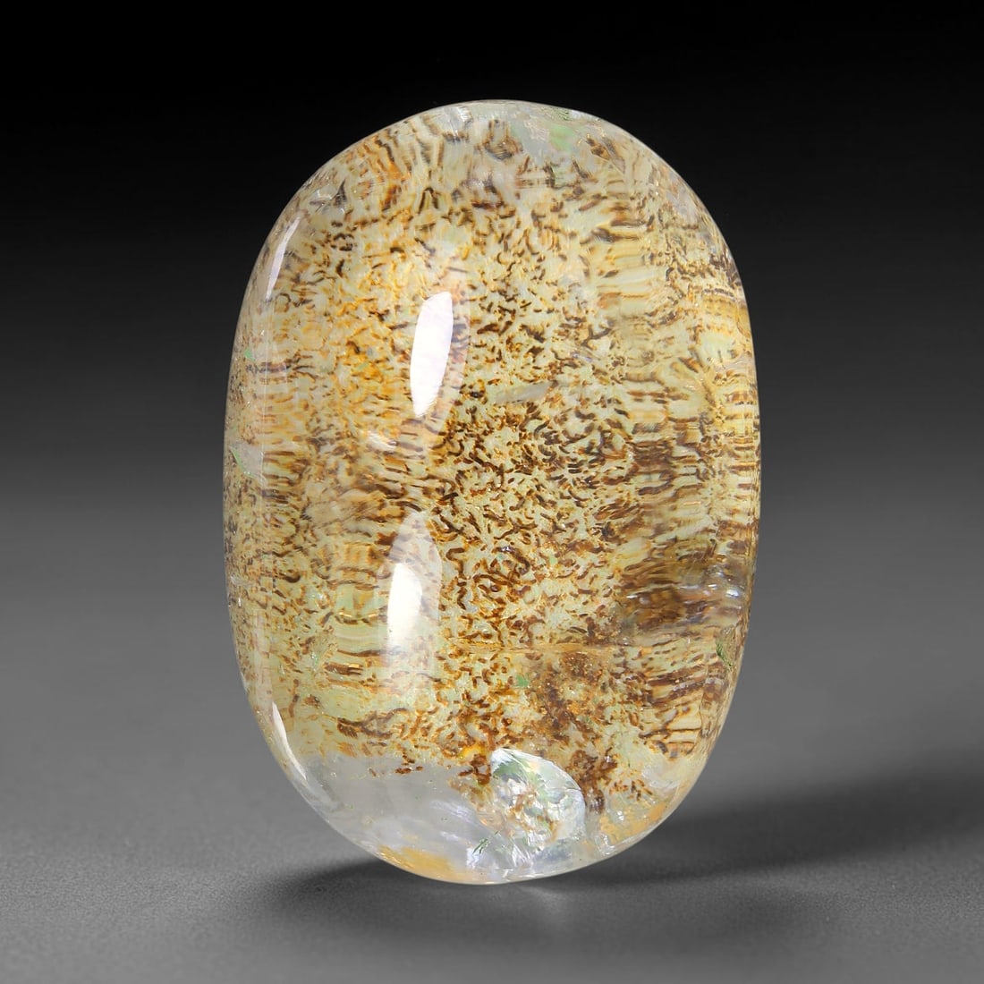 25.34ct Natural Brazilian Phantom Quartz Oval Cabochon Loose Gemstone, 80YV: This smoothly polished cabochon of natural phantom quartz preserves delicate layered phantom crystal formations enclosed inside transparent quartz host. The domed polished surface offers unobstructed 